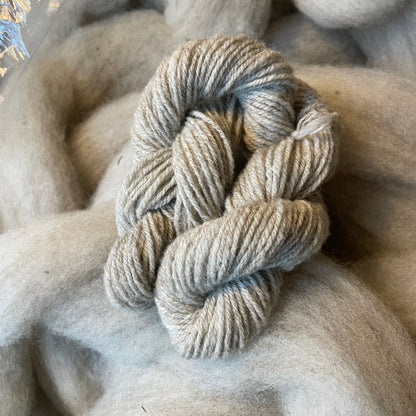 Grey suffolk with sample handspun skein